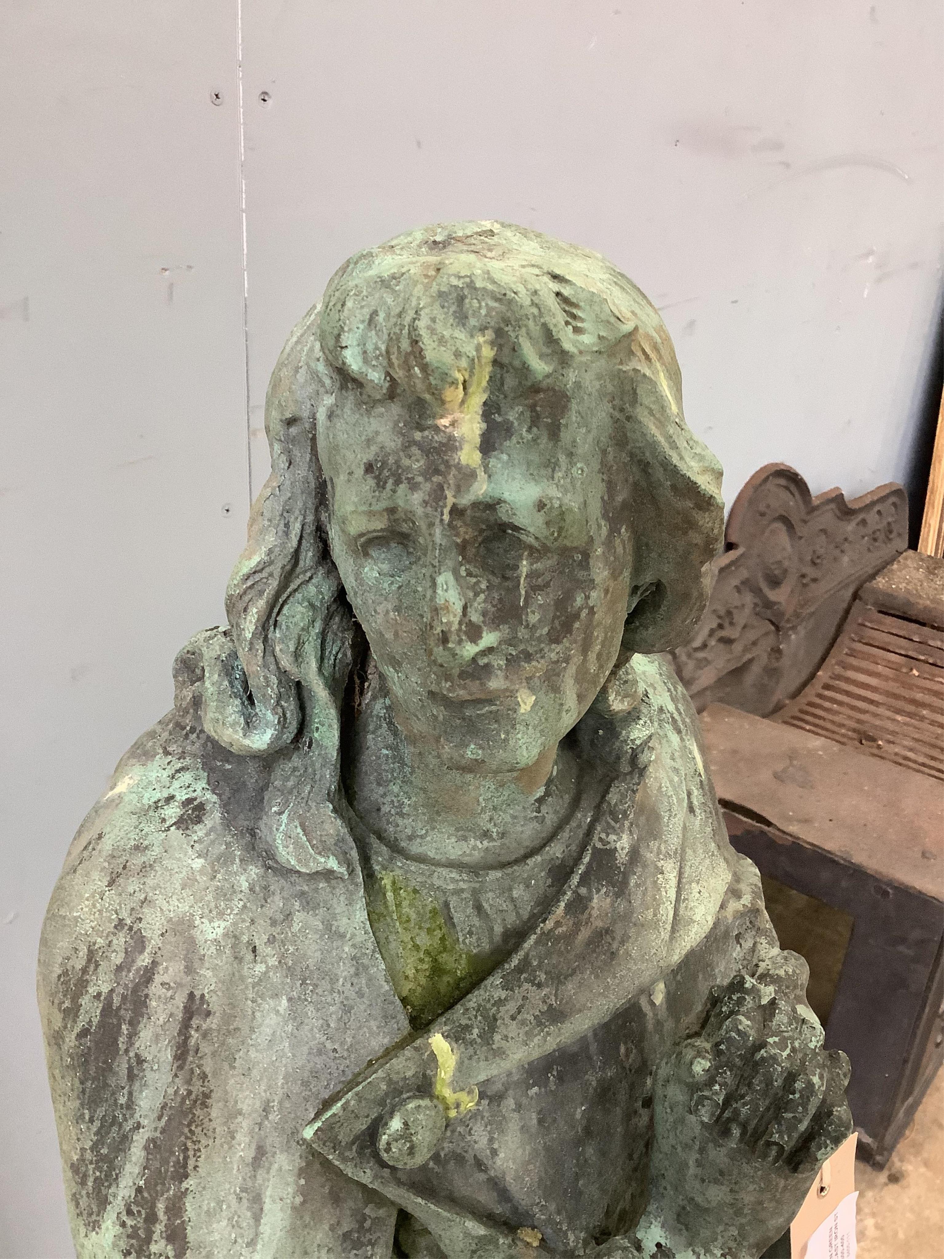 A Victorian green patinated cast iron statue of a saint in prayer, height 92cm. Condition - poor to fair